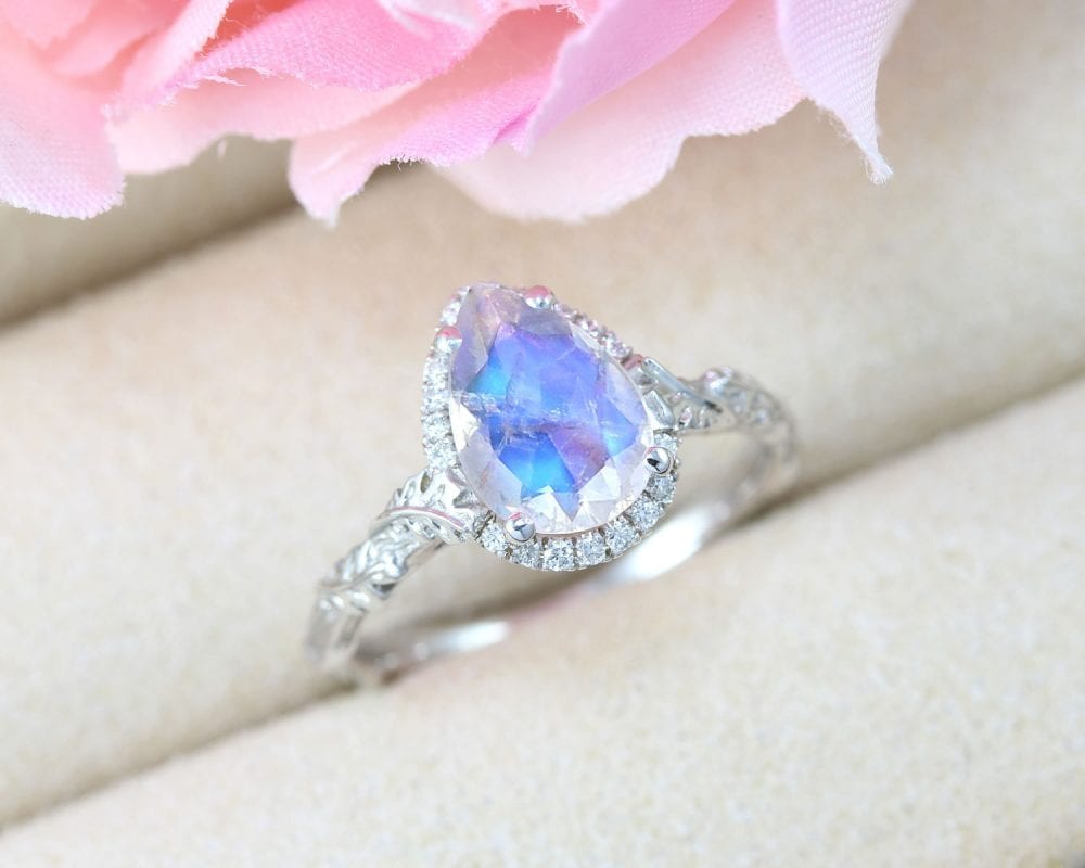 pear moonstone engagement ring, nature inspired halo diamond ring